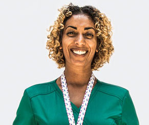 A healthcare professional smiling