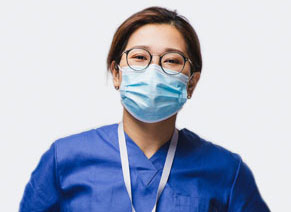 A healthcare professional wearing a surgical mask