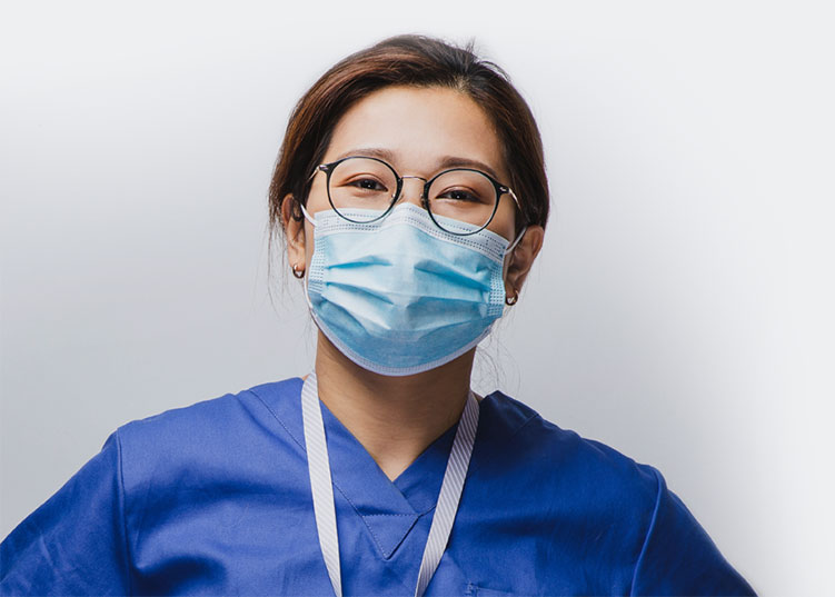 A healthcare professional wearing a surgical mask