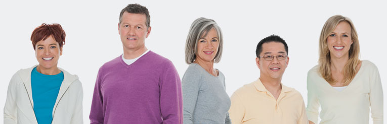Group of people standing and smiling